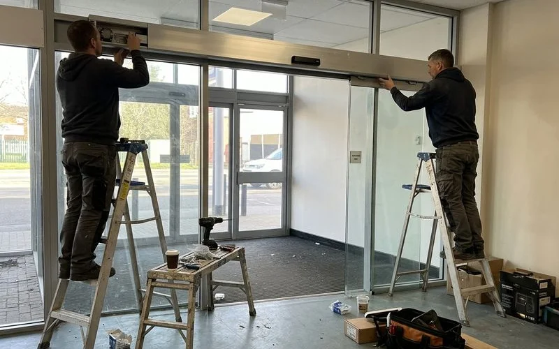 Installing the HH150 header mechanism and hanging the new glass leaves