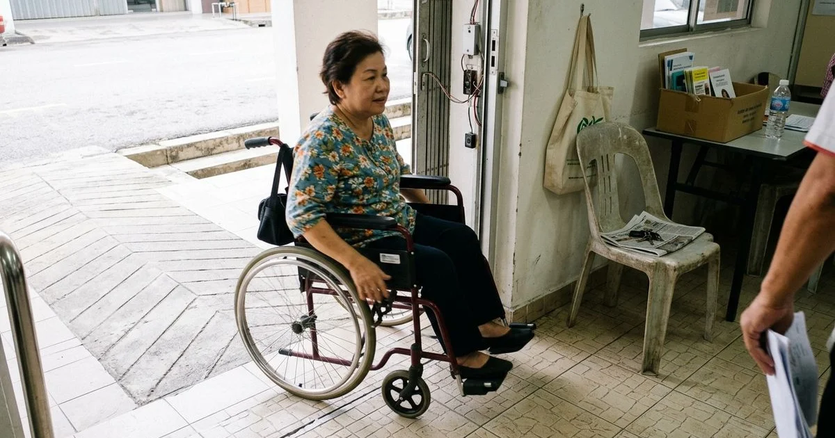 Automatic swing door at a Malaysian clinic accessible entrance